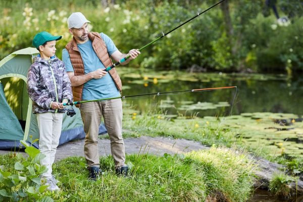 man-teaching-boy-fishing-TQ9ABD5-resize.jpg